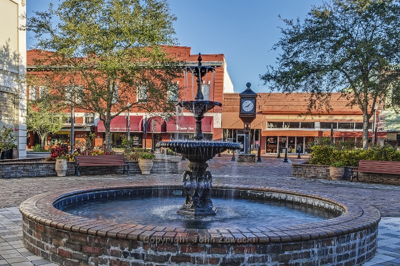 Sanford-Magnolia Square- Fountian-0265-8x10.tif - Magnolia Square Fountain, Sanford Florida.  One of Robinson Iron’s historic reproduction cast iron fountains – the Tall Crane. The Tall Crane fountain is cast from patterns that predate the Civil War. The scale, materials and design of the fountain successfully harmonize with the city’s historic surroundings.  The cooling splash of water combined with the beauty of ornamental iron insures that the Magnolia Square Fountain will continue to be a living, thriving icon for the City of Sanford.